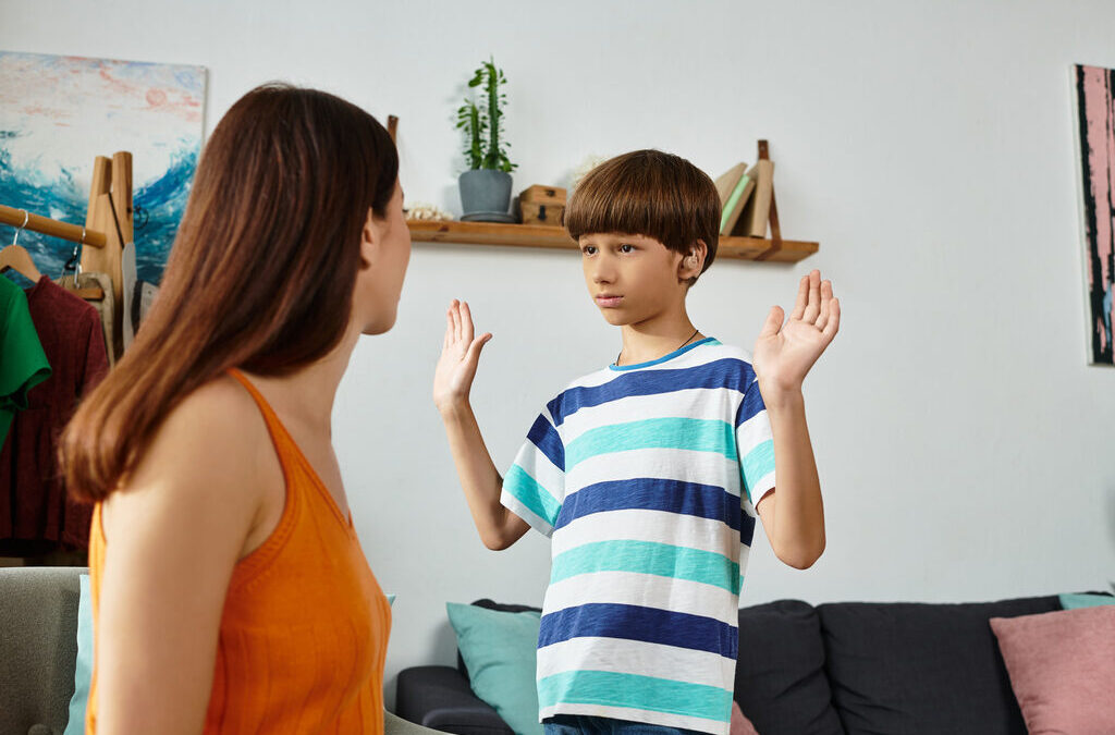 Capability Support moments between a mother and her son embracing communication and understanding at home